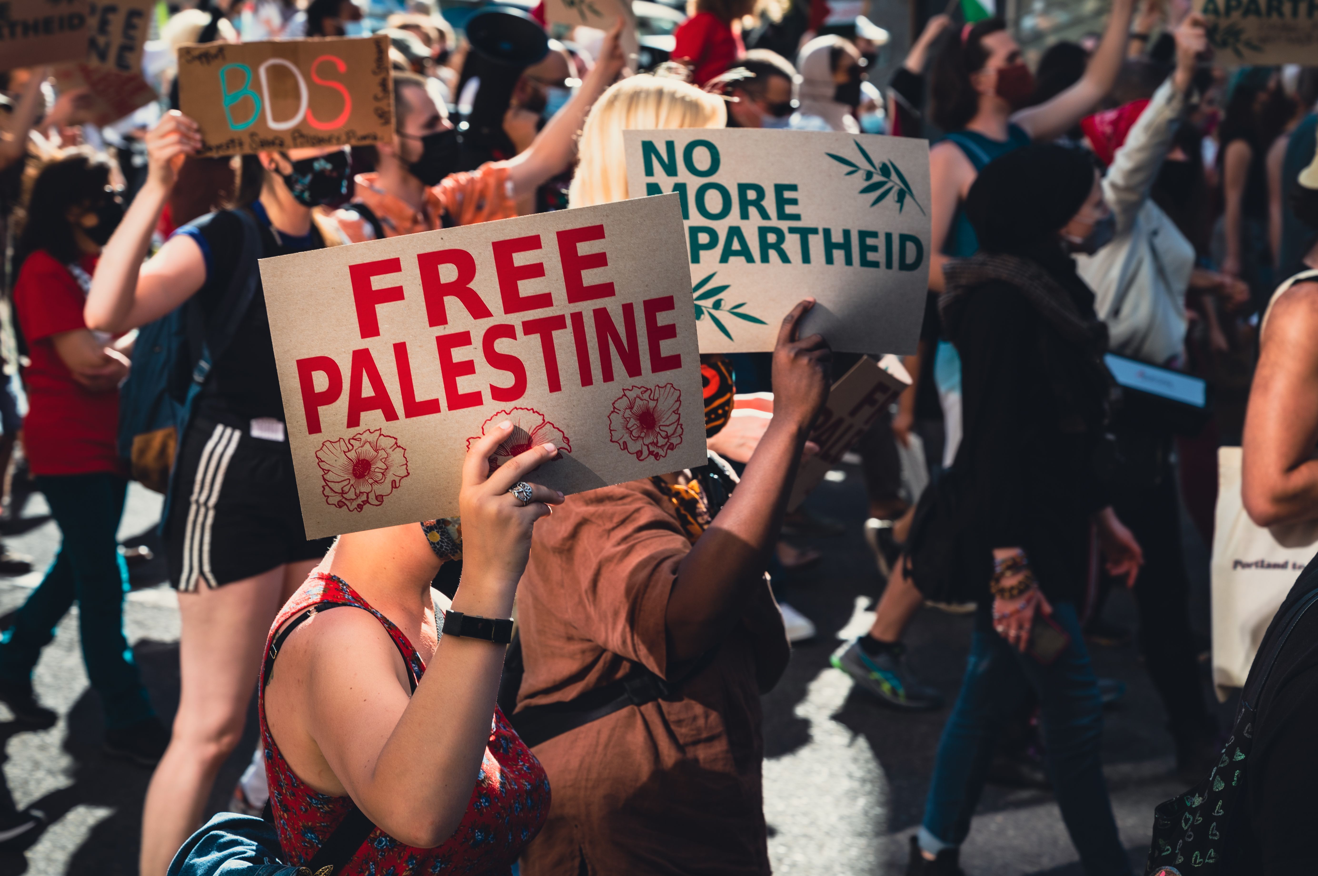 Anti-Israel demonstration showing an apartheid banner